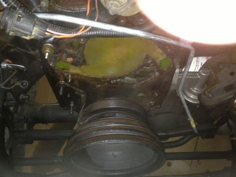 1978 Ford Bronco - Close-up view of engine components including pulleys and hoses.