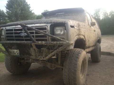 1979 Ford Bronco - This heavily modified 1979 Ford Bronco is caked in mud, ready for off-road adventure.