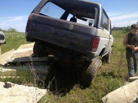 1979 Ford Bronco - This 1979 Ford Bronco is shown navigating an obstacle course of concrete slabs.