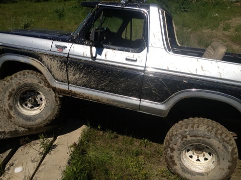1979 Ford Bronco - This Ford Bronco is covered in mud after an off-road excursion.