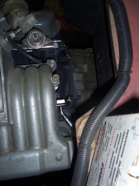 1968 Ford Bronco - Engine components including intake manifold and fuel lines are visible in this close-up view.