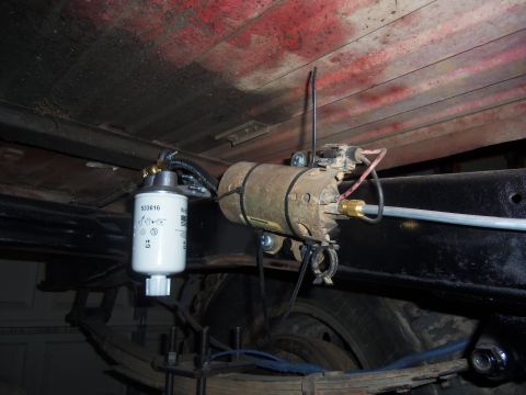 1968 Ford Bronco - Close-up view of a fuel filter and pump assembly, showing part number 533616 and associated plumbing.