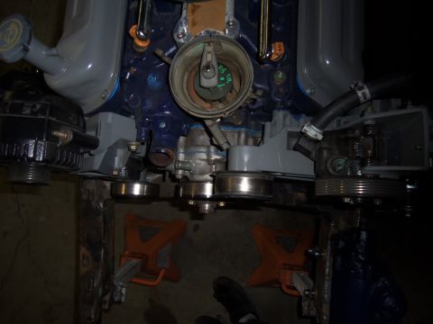 1968 Ford Bronco - Close-up of an engine block assembly, showing various components and support stands.
