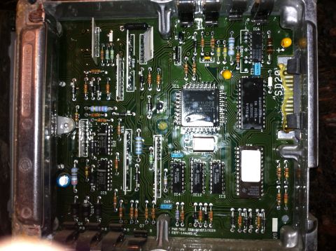 1990 Ford F-150 - Internal view of an electronic control module, showing its complex circuitry and components.
