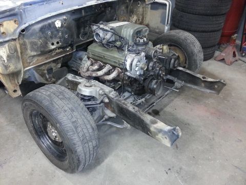 1967 Ford F-100 - Front clip and engine bay of a 1967 Ford F-100 undergoing restoration.