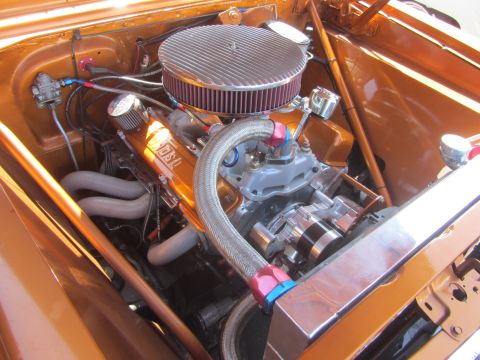 1964 Ford Ranchero - Custom V8 engine bay features chrome accents and performance headers.