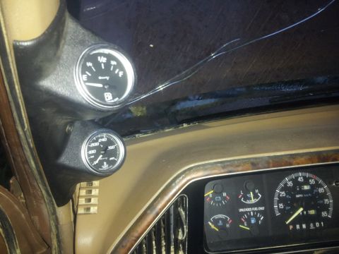 1988 Ford Bronco - The interior of a 1988 Ford Bronco shows a fuel gauge and voltmeter, along with the main instrument cluster.