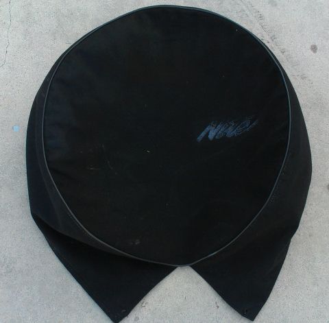 1994 Ford Bronco - This black tire cover features a "Nite" logo, likely for a special edition vehicle.