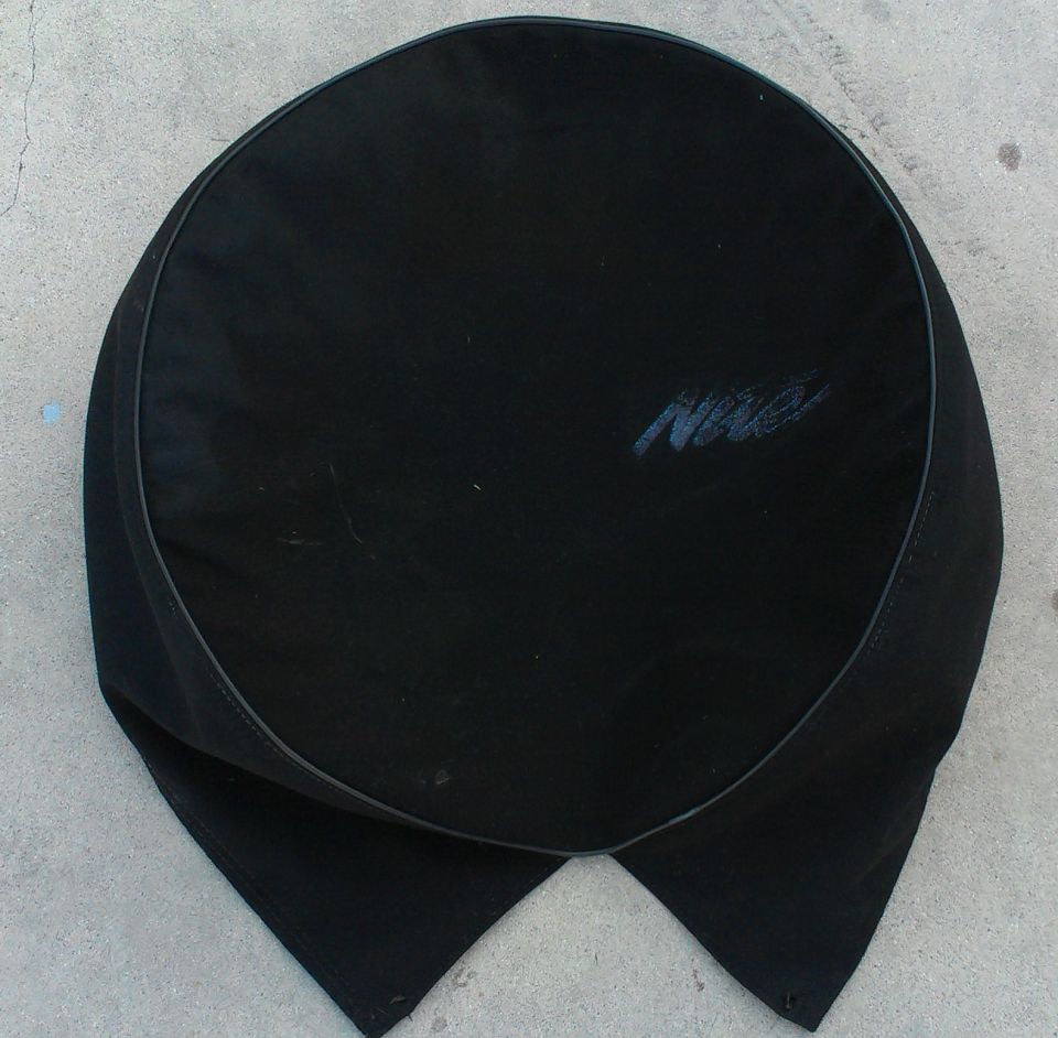 Black tire cover with "Nite" logo