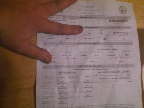 2003 Ford Crown Victoria - This Illinois vehicle inspection report details a 2003 Ford Crown Victoria LX, with its inspection completed in July 2012.