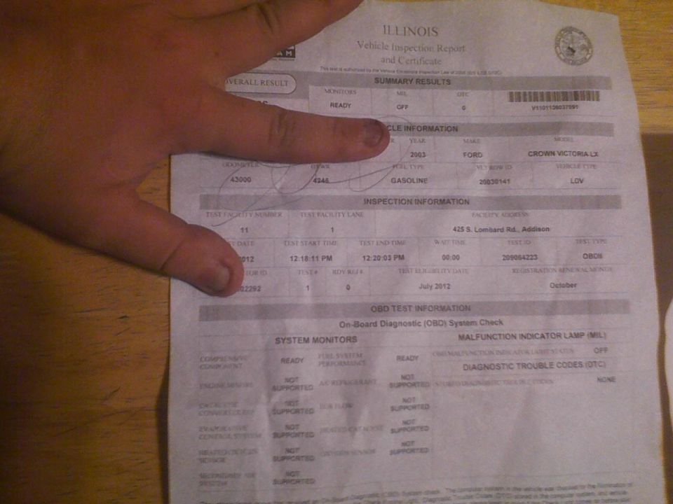 Vehicle inspection report showing 2003 Ford Crown Victoria LX, gasoline, with inspection date July 2012
