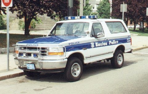 1992 Ford Bronco - Boston Police Ford Bronco SUV, likely from the early 1990s, parked on a street.