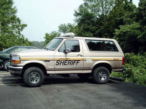 1992 Ford Bronco - This Ford Bronco is marked as a Jefferson County Sheriff's vehicle, a light bar and distinctive side striping.