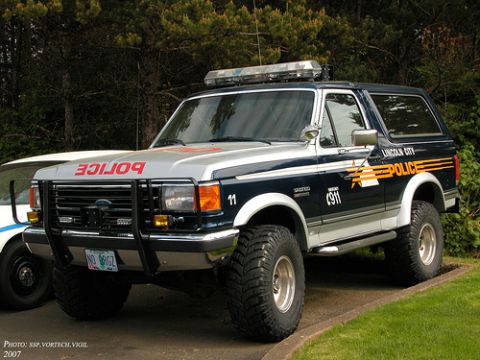 1992 Ford Bronco - This 1992 Ford Bronco served as a Lincoln City police vehicle, a light bar and "POLICE" markings.