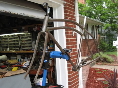 1994 Ford Bronco - A bare bicycle frame, showing its metal construction and awaiting restoration.