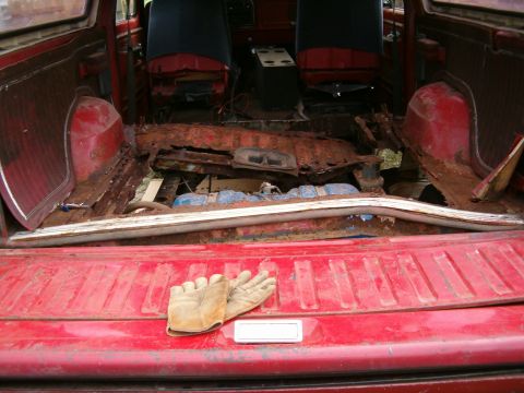 1979 Ford Bronco - That came from here, plus the rest, but the camera died. Vacummed out over 20lbs of rusts, and have over that on the ground under it.