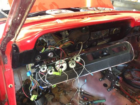 1964 Ford Fairlane - The interior of a 1964 Ford Fairlane shows exposed dashboard wiring and gauges during restoration.