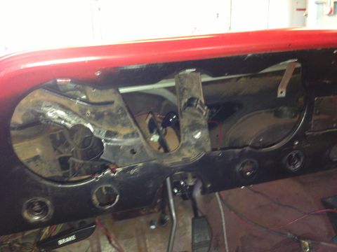 1964 Ford Fairlane - The interior of a 1964 Ford Fairlane shows a disassembled dashboard with exposed wiring and missing instrument cluster components.