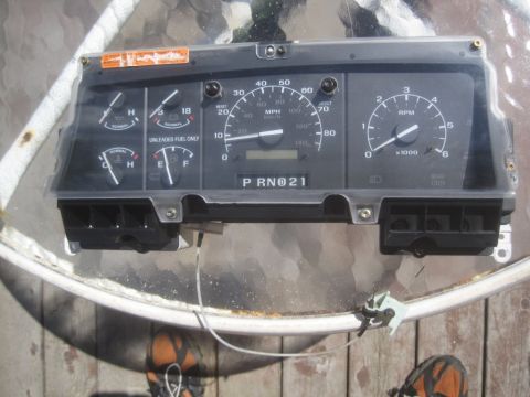 1993 Ford Bronco - This is a vehicle's instrument cluster, showing various gauges and the gear selection indicator.