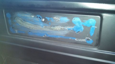 1979 Ford Bronco - Close-up of an interior component with blue paint marks.