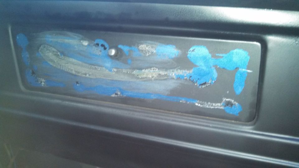 Interior part with blue paint splatters