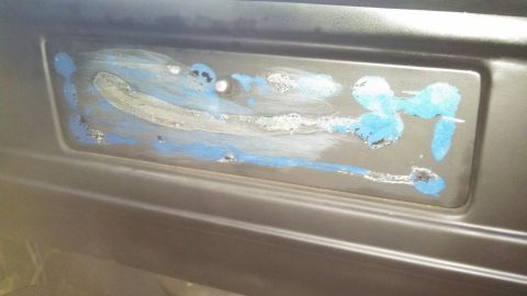 1979 Ford Bronco - Dashboard vent shows signs of paint application or removal attempts.