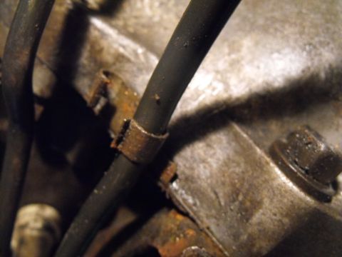 1986 Chrysler Fifth Avenue - With a tappered punch or a piece of the new 3/8 inch line you can stretch and coax the stock transmission line clips to accept the bigger 3…