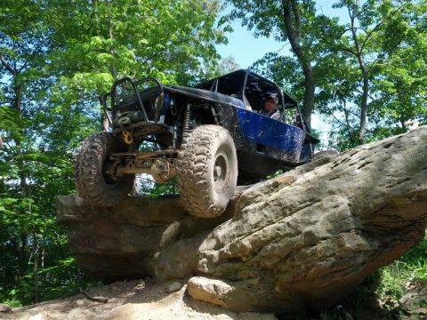 1967 Ford Mustang - Custom off-road buggy navigates a challenging rocky terrain during an outdoor adventure.