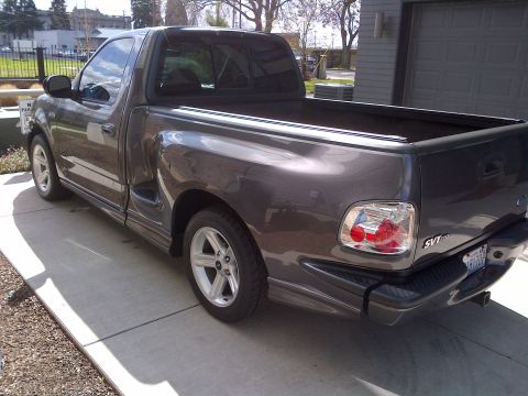 2003 Ford F-150 - Rear three-quarter view of a gray 2003 Ford F-150 SVT Lightning pickup truck.