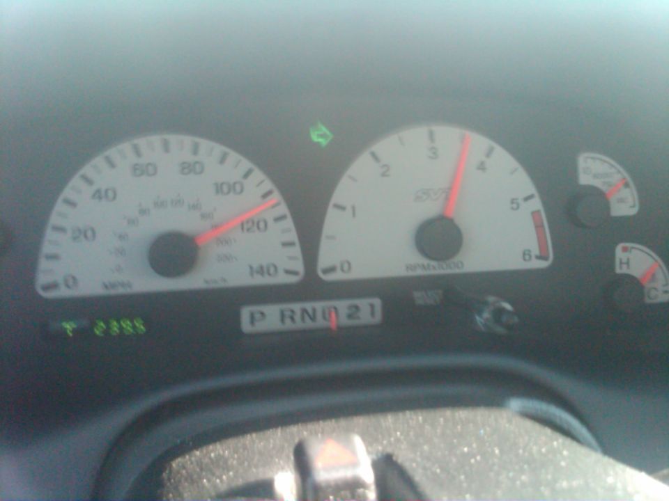 2003 Ford F-150 Lightning dashboard with speedometer, tachometer, and gear indicator