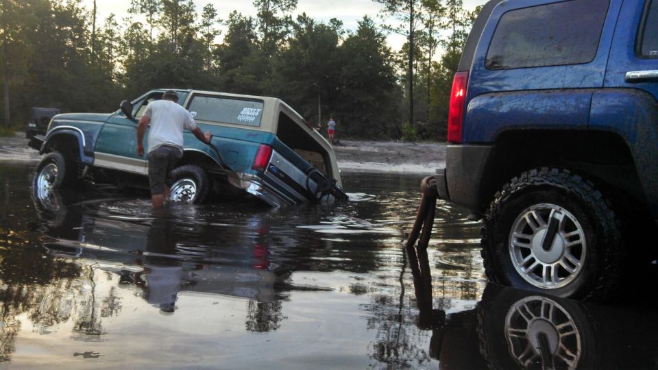 Stuck at a place called Plathe. There was a tire hidden under the water I got stock on and dug in.