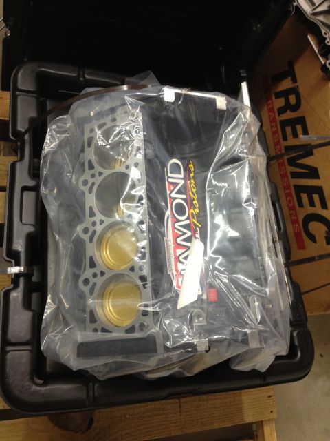 1992 Ford Crown Victoria - Engine block and pistons, branded Diamond Pistons, in a protective case.
