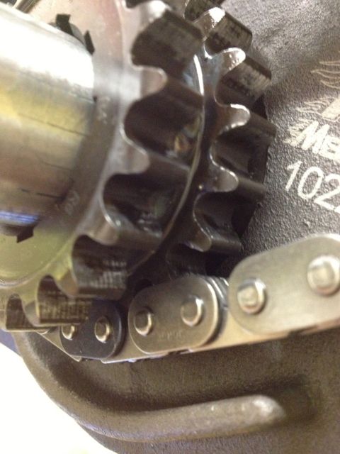 1992 Ford Crown Victoria - Engine timing chain and sprocket assembly with part number visible.
