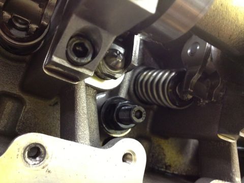 1992 Ford Crown Victoria - Internal engine components, including a valve spring and rocker arm, are visible in this close-up shot.