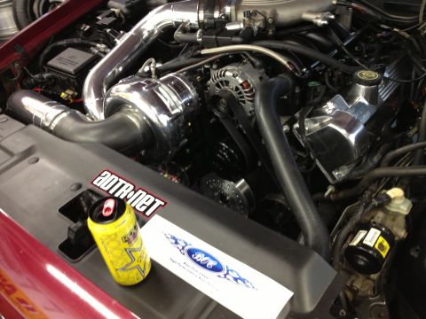 1992 Ford Crown Victoria - Close-up of a modified V8 engine, a supercharger and chrome components.