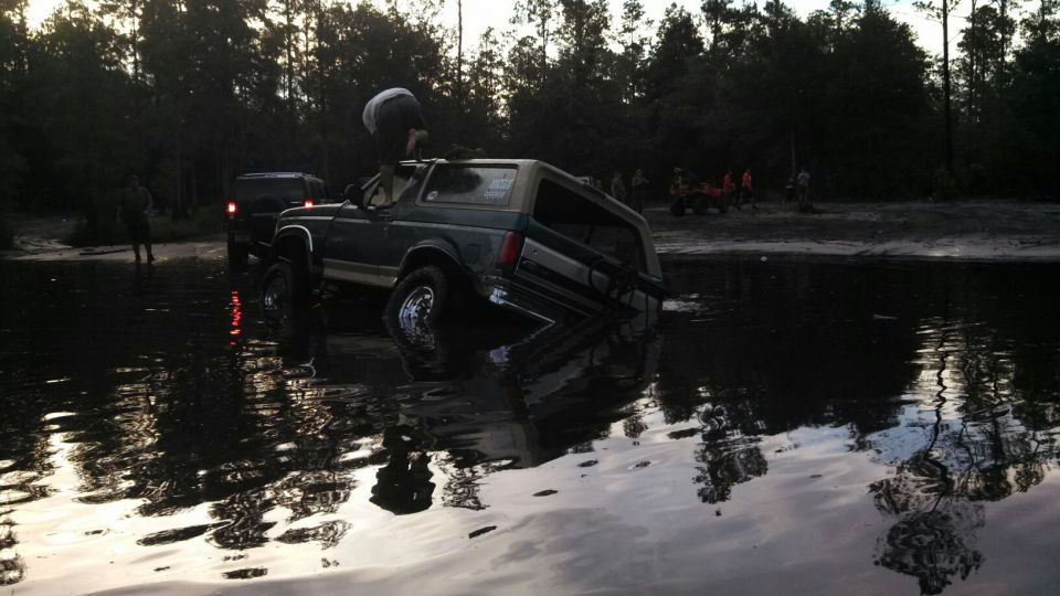 Stuck at a place called Plathe. There was a tire hidden under the water I got stock on and dug in.