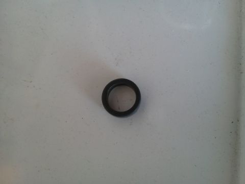 1988 Ford Bronco - A single black rubber seal is shown against a textured gray background.