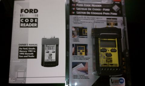 1992 Ford F-150 - Owner's manual and Ford OBD I code reader tool are displayed together.