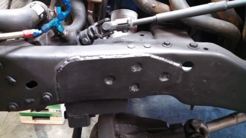 1967 Ford F-250 - Modified truck frame showing custom welds and steering components, suggesting a custom build or repair.