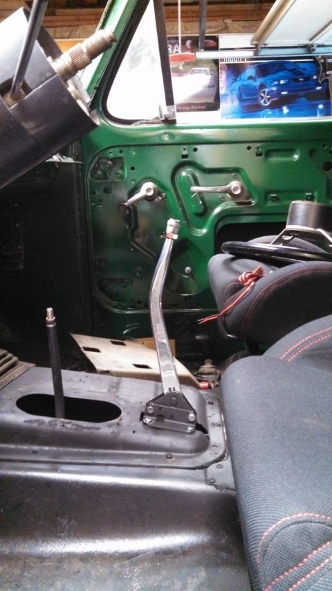 1967 Ford F-250 - Interior view of a truck cab, showing the floor shifter and partially visible seats.