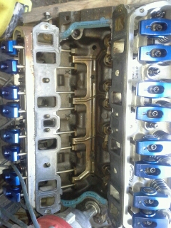 1992 Ford Bronco - Close-up view of a Ford V8 engine block, showing the intake ports and valve train components.
