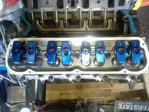 1992 Ford Bronco - Engine valve train components, including blue roller rockers and valve springs, are visible in this close-up view.