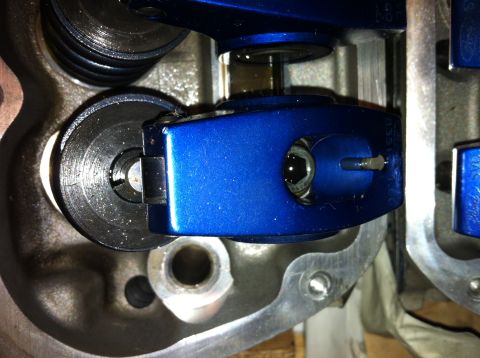 1992 Ford Bronco - Engine components: blue roller rocker arm and valve spring assembly.