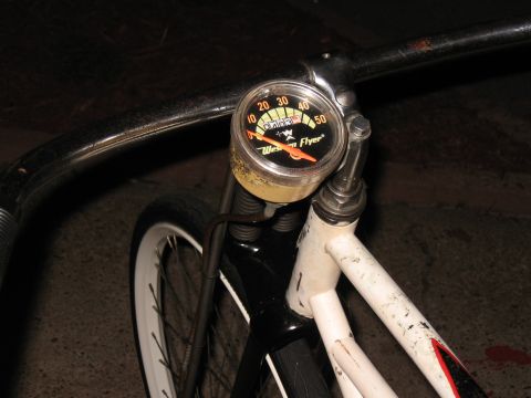 1994 Ford Bronco - A close-up view of a vintage bicycle's handlebar-mounted speedometer.
