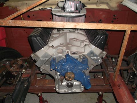 1964 Ford Fairlane - Engine bay of a vehicle, showing the engine and air filter assembly.