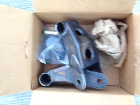 1986 Ford Bronco - These suspension shackles are packaged in a cardboard box, ready for installation.