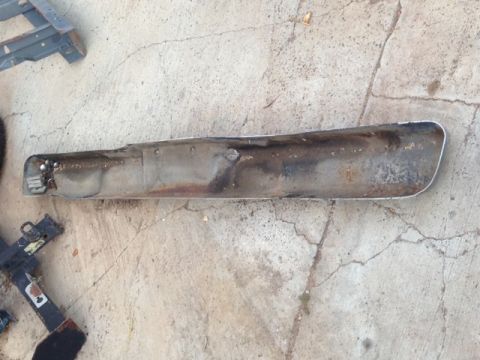 1986 Ford Bronco - This appears to be a damaged bumper section, possibly from an older vehicle.