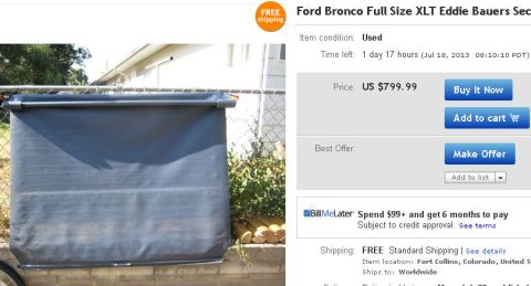 1994 Ford Bronco - Screenshot of an eBay Buy It Now listing for a used "Ford Bronco Full Size XLT Eddie Bauers" security cargo cover at US $799.99 with free s…