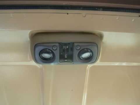 1983 Ford Bronco - Yeah, I know. But Ford never offered eyeball dome lamps in mocha, and this looks & works great. When the headliner is in, it should be perf…