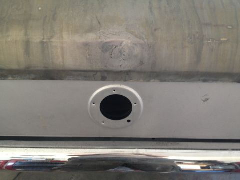 1965 Ford Mustang - The rear panel of a 1965 Ford Mustang shows the fuel filler cap assembly.